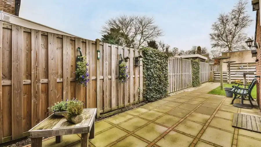 New timber fence and paved outdoor area built by My Homes Construct Ltd in West Auckland
