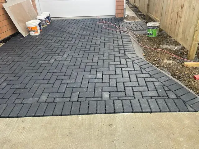 Concrete driveway construction and paving completed for an Auckland home by My Homes Construct Ltd