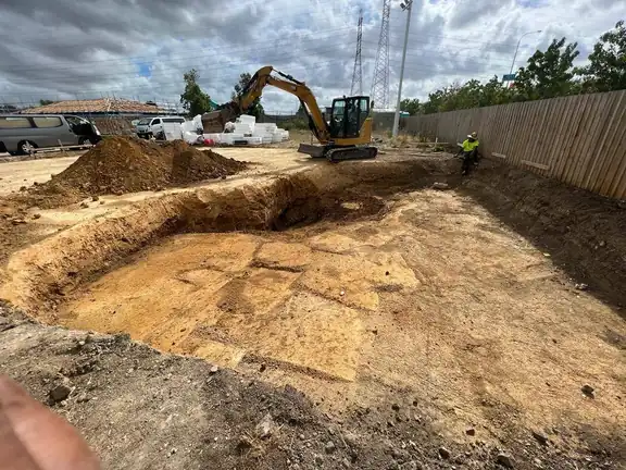 Excavation and earthworks with a digger, Auckland Excavation and earthworks with a digger in progress on an Auckland property
