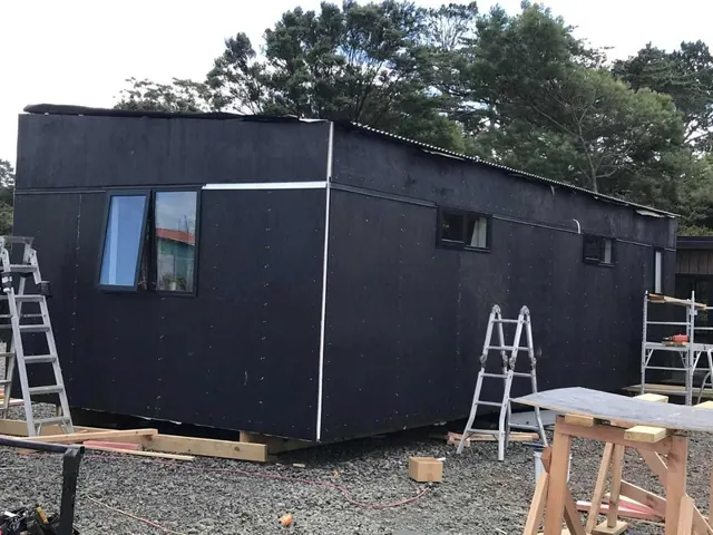 Tiny home and cabin build in progress on an Auckland property