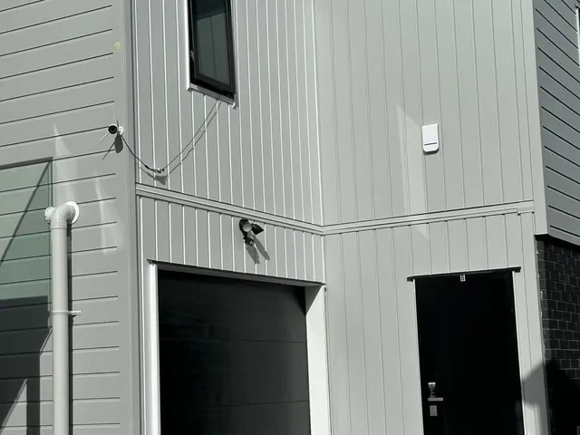 Exterior house painting and cladding finish completed for an Auckland home by My Homes Construct Ltd